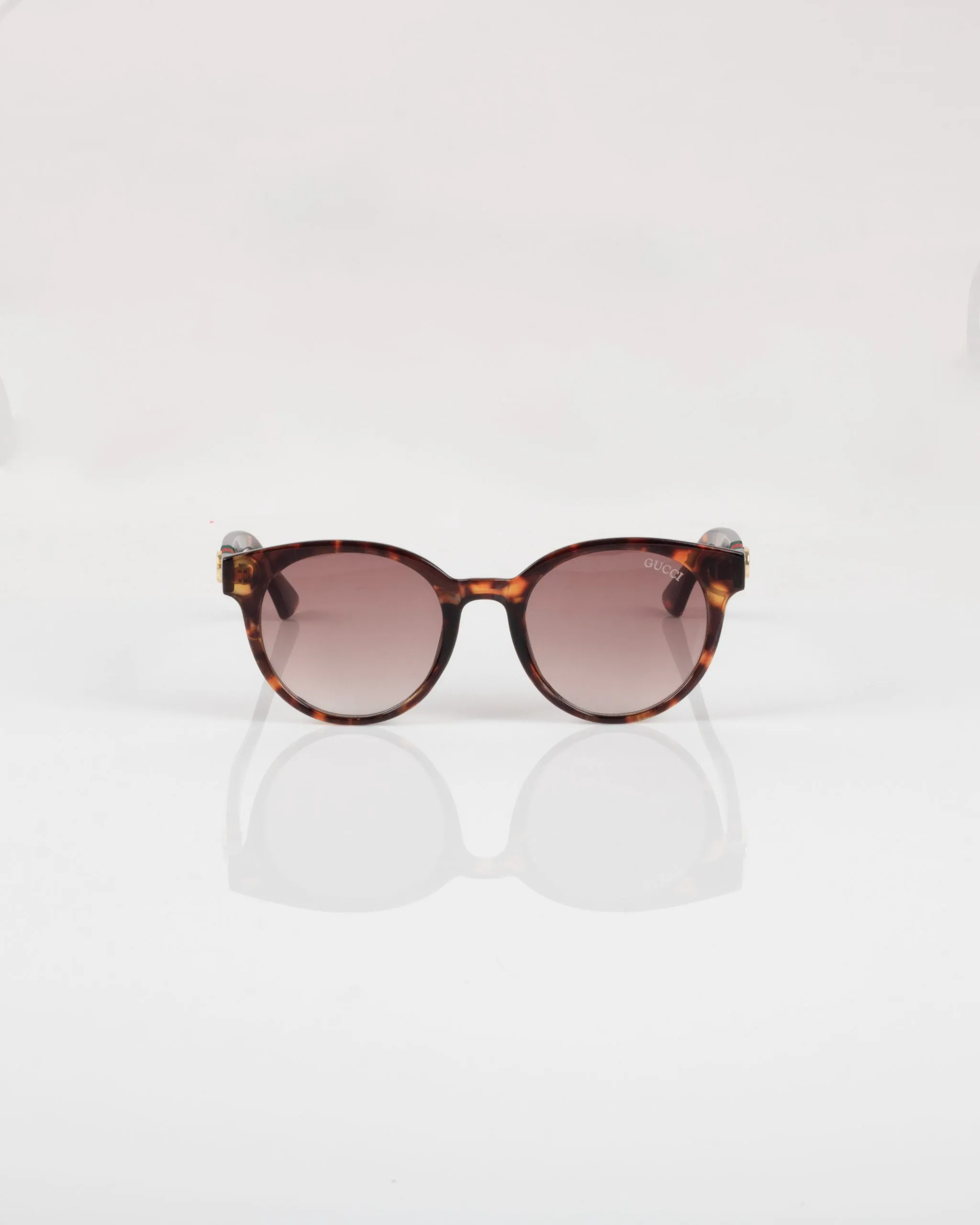 عینک آفتابی گوچی هاوانا مدل 9898 - Gucci 2 عینک آفتابی گوچی هاوانا مدل 9898 - Gucci - Image 2